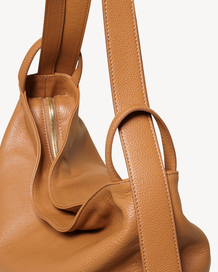 Backpack that converts to shoulder bag top