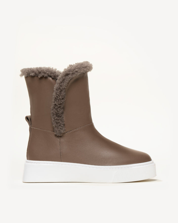 Shearling boots sale discount